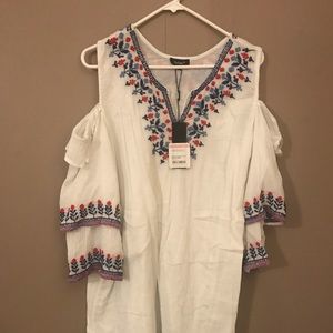 Patterned dress with shoulder cut outs